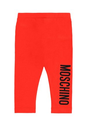 Rode katoenen leggings met een aangesloten ontwerp. Zwarte "MOSCHINO"-tekst verticaal gedrukt aan de linkerkant. Vlotte textuur met een elastische tailleband.