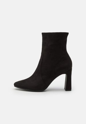 Bottines à talons hauts - black