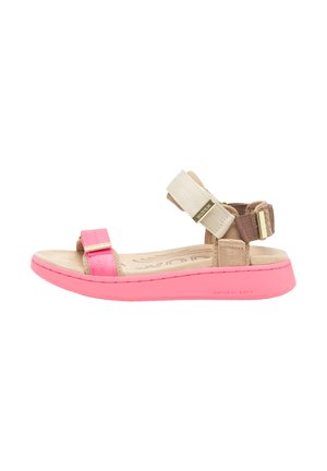 Sandalo con cinturini con suola rosa, cinturini beige e marroni e dettagli metallici. Dotato di una soletta imbottita con l'etichetta "NATURAL SOFT".
