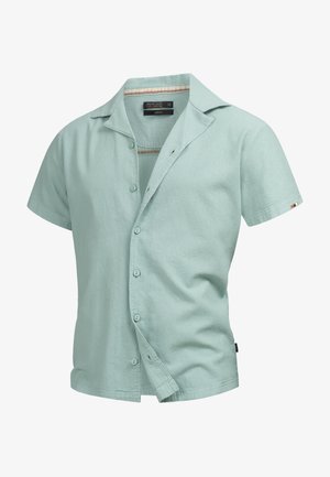 Ljust grön kortärmad skjorta i en strukturerad tygkvalitet med knäppning framtill, krage och kontrasterande innermaterial. Har en liten logotyp på ärmen.