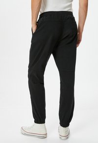 Koton DRAWSTRING POCKET DETAIL - Jogginghose - black