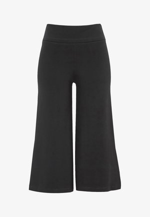 Schwarze weit geschnittene Hosen bestehen aus einem glatten, dehnbaren Stoff und verfügen über einen hohen, bequemen Bund sowie keine sichtbaren Taschen oder Verschlüsse.