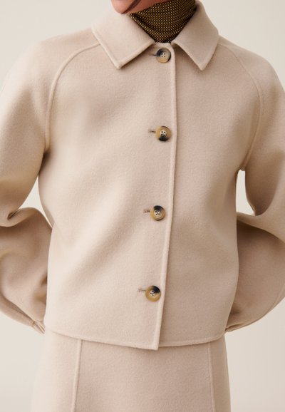 Claudie Pierlot Chaqueta de entretiempo - beige