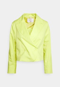 Cropped jacket in bright neon yellow, featuring a double-breasted design, notched collar, and smooth texture. Long sleeves.