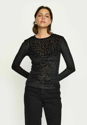 Pluus - black