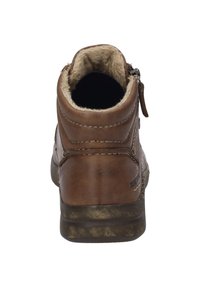 Brauner Knöchelstiefel mit Obermaterial aus strukturiertem Leder, Kunstfellfutter, seitlichem Reißverschluss und Gummisohle mit strukturiertem Profil.