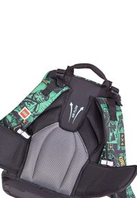 Green and black backpack featuring a mesh back for airflow, padded straps, and a LEGO logo. Contains graphic designs and adjustable hardware.
