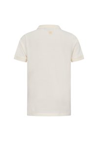 Polo in un crema chiaro, a maniche corte, in materiale cotone, con un logo discreto sul colletto posteriore e bordi delle maniche arrotolati.