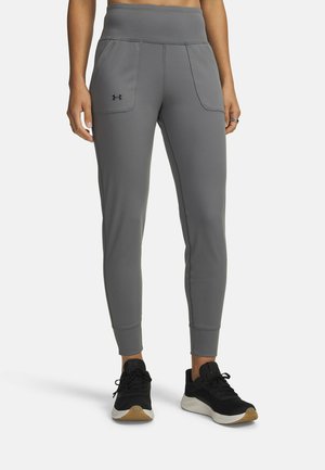 MOTION JOGGER - Tracksuit bottoms - clay green