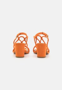 Marco Tozzi Sandaalit nilkkaremmillä - orange