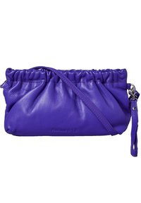 Purple leather clutch bag with gathered top, metal hardware, and adjustable strap. Smooth texture and logo embossed on the front.