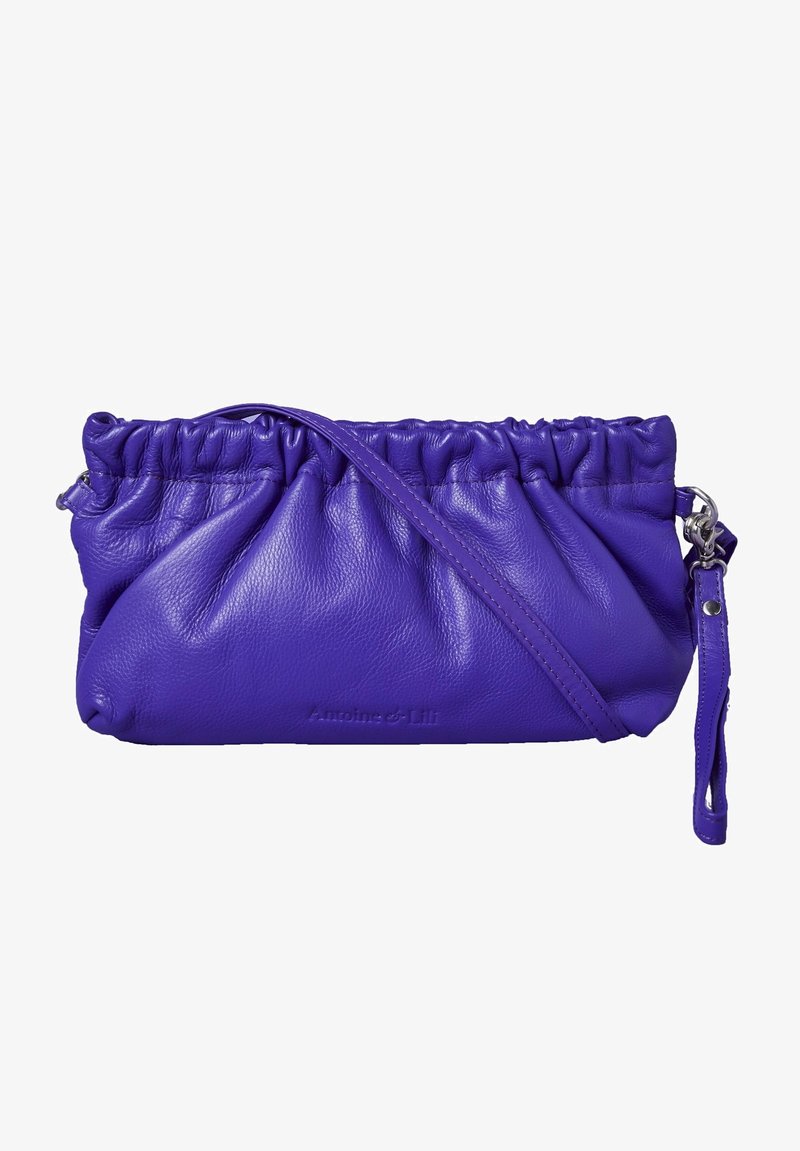 Purple leather clutch bag with gathered top, metal hardware, and adjustable strap. Smooth texture and logo embossed on the front.