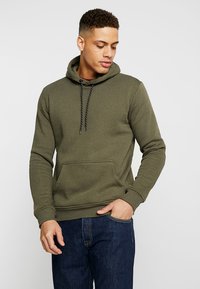 Olijfgroene hoodie van een katoenmix, met een voorzak, een capuchon met trekkoord en zwarte accenten, en geribbelde manchetten.