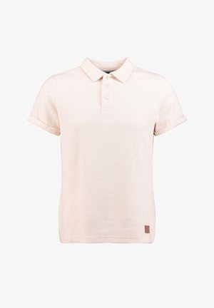 Hellbeiges Poloshirt mit kurzen Ärmeln und umgeschlagenen Manschetten, drei Knöpfen, strukturierter Stoff und einem kleinen braunen Logopatch nahe dem Saum.