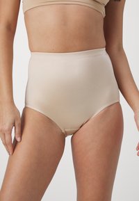 High-waisted bikini bottom in soft beige fabric, smooth texture, minimalist design, with clean lines and no visible hardware.