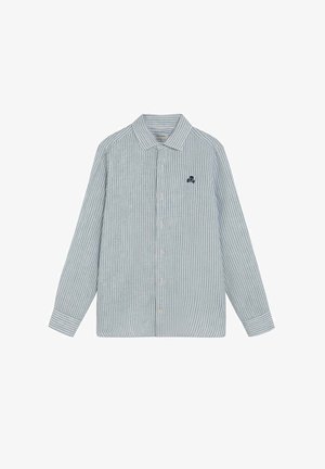 Chemise à manches longues avec boutons, rayures verticales gris clair et blanches, et petit logo de crâne sombre brodé sur la poitrine gauche.