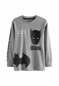 Graues Langarm-T-Shirt mit Batman-Grafiken, darunter eine mit Pailletten verzierten Batman-Maske, ein großes schwarzes Fledermaus-Logo und den Text: "Gotham City," "Der maskierte Rächer."