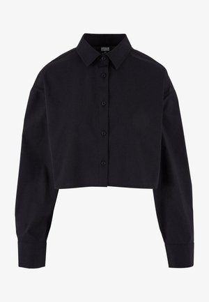 Camicia nera tagliata, realizzata in cotone, con maniche lunghe, colletto classico e orlo dritto.
