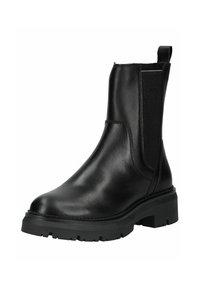 Bota Chelsea de cuero negro con panel elástico lateral, lengüeta en la parte trasera y suela gruesa de goma con tacos para mayor tracción y durabilidad.