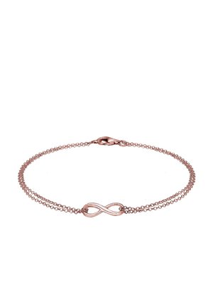 Bracelet délicat en or rose avec double chaîne et motif central symbole de l'infini, fermé par un fermoir homard.