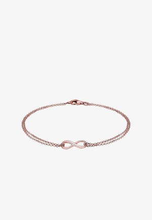 Bracelet délicat en or rose avec double chaîne et motif central symbole de l'infini, fermé par un fermoir homard.