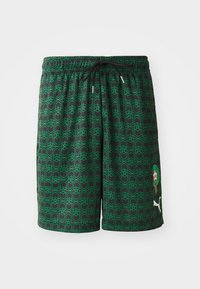 Sorte shorts med et geometrisk grønt mønster, udstyret med elastisk talje og snørebånd. Inkluderer et marokkansk emblem og Puma-logo.