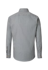 Long-sleeved shirt with a light blue background, featuring a geometric pattern in navy and black, and buttoned cuffs. Pointed collar.