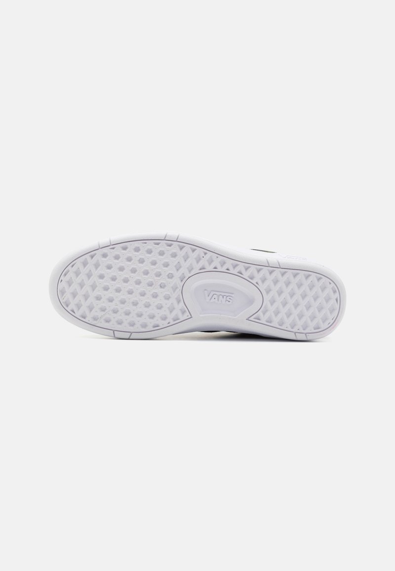 Semelle de sneaker blanche en caoutchouc avec un motif hexagonal texturé et un petit logo "VANS" incrusté. Design plat et bords lisses.