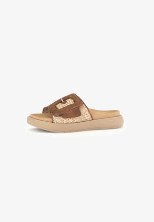Slide sandal featuring a woven beige textile upper with a brown leather strap and buckle detail, set on a beige rubber sole.