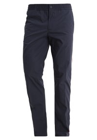 Men’s navy blue casual pants with elastic waistband and button closure, straight fit, and subtle side stripe detail.