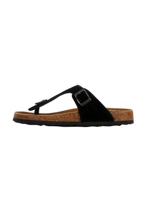 Sandale à semelle compensée en nubuck noir avec une boucle réglable, semelle en liège et semelle en caoutchouc noir texturé. Présente un design minimaliste.