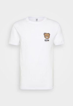 White cotton t-shirt featuring a brown bear graphic on the left chest and "MOSCHINO UNDERBEAR" text in black below the design.