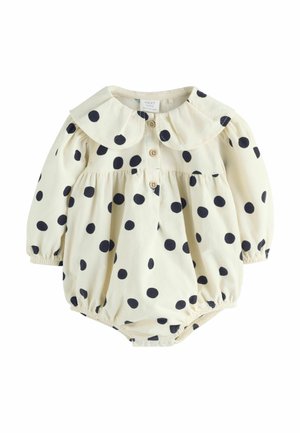 Body bébé à manches longues couleur crème à pois noirs, avec un col rond et une patte de boutonnage à trois boutons ; tissu doux et léger.