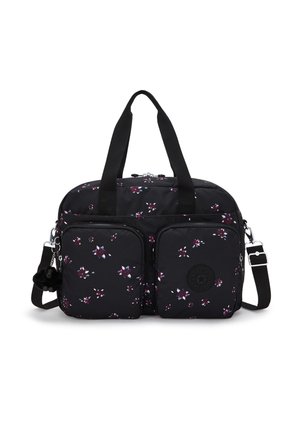 Black fabric bag adorned with a floral pattern in purple and white, featuring two front pockets, dual handles, and a detachable shoulder strap.