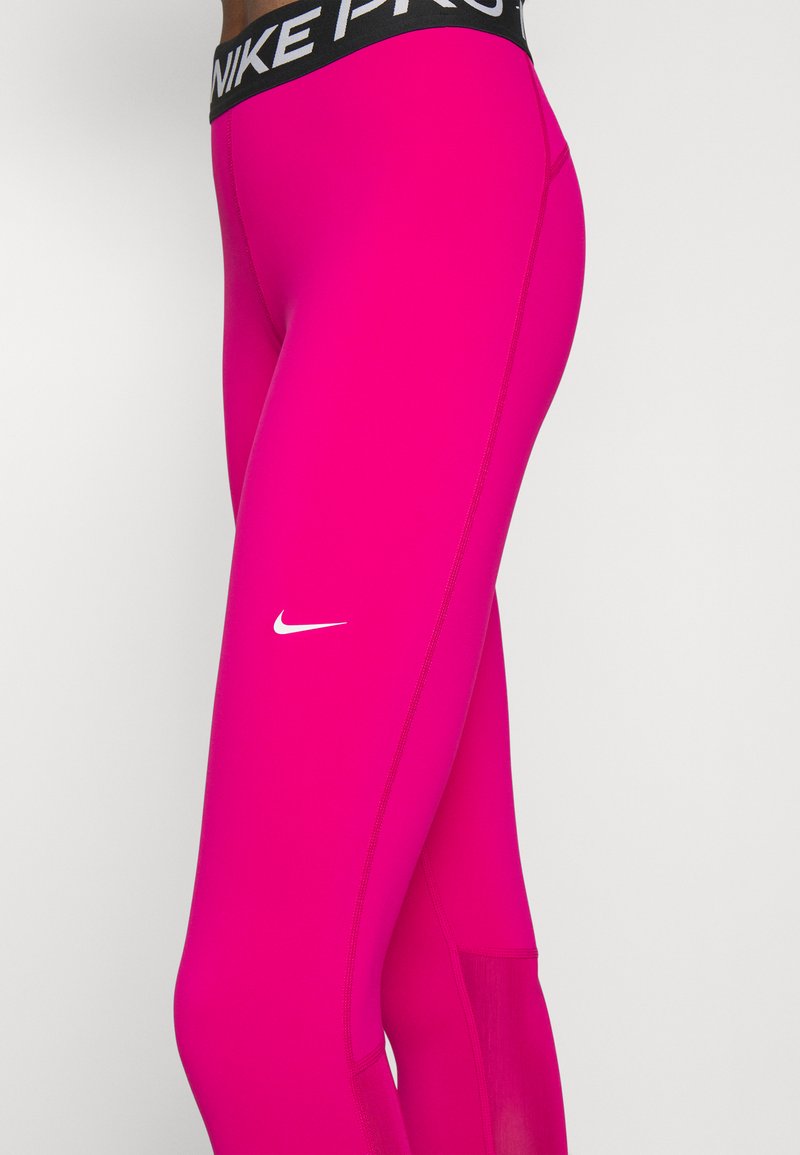 black and pink nike leggings