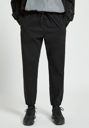 Jogginghose - mottled black