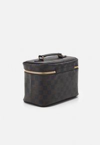 Brown checked makeup bag with a textured leather finish, zip closure, and a top handle. Compact rectangular shape. Gold-tone hardware accents.