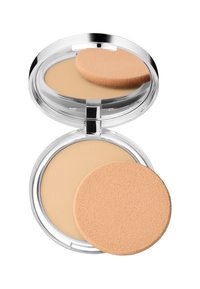 Poudre compacte dans un boîtier en plastique transparent. Présente une poudre lisse et beige ainsi qu'un applicateur rond et doux de couleur pêche clair.