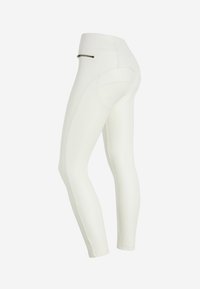 Leggings blancos de cintura alta con textura suave, bolsillo lateral con cremallera y detalle de costura curva en la parte trasera. Diseño ajustado al cuerpo.