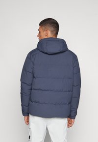 Patagonia DOWNDRIFT JACKET - Páperová bunda - smolder blue/burnished red