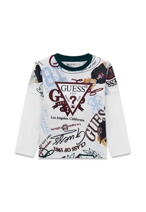 Langärmeliges weißes Kinderhemd mit mehrfarbigen GUESS-Logos, Texten und Teddybär-Grafiken auf der Vorderseite und den Ärmeln.