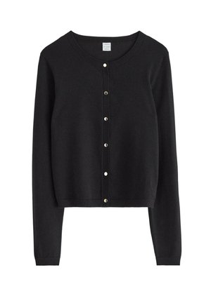Black long-sleeve cropped cardigan with round neckline and silver snap buttons down the center front.