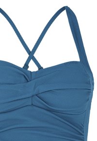 Mėlynas tekstūruotas bikini viršus su reguliuojamomis kryžminėmis juostelėmis ir surinkta priekine dalimi, pasižymintis lygiu paviršiumi ir sustiprintomis siūlėmis.