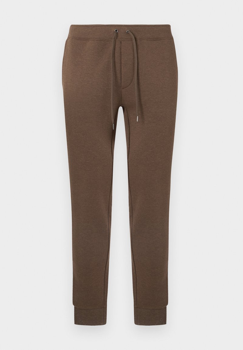 Braune Sweatpants aus weichem Stoff, mit einem Kordelzugbund, seitlichen Taschen und eng anliegenden Bündchen an den Knöcheln.