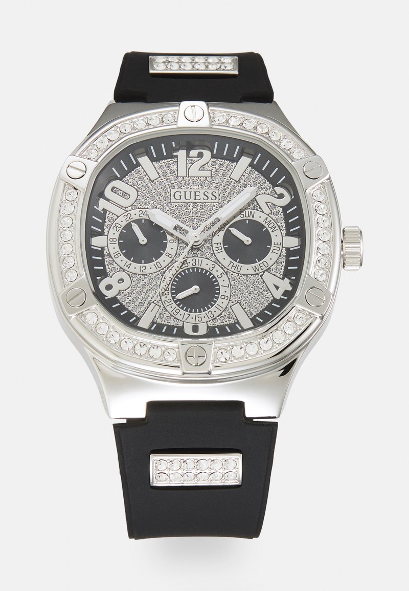 Black silicone strap watch with a silver stainless steel case, glittery black face, three subdials, and crystal accents around the bezel.