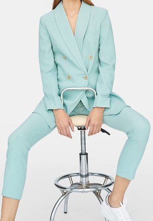 Halflange jas - turquoise