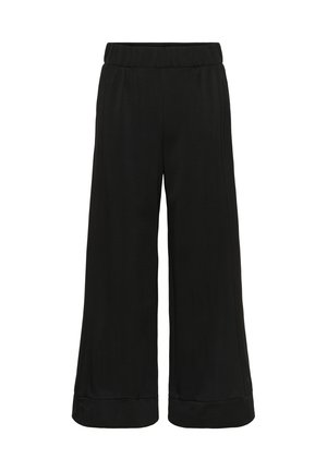 Čierne široké nohavice s elastickým pásom, jemnou textúrou a zrolovanými manžetami na leme. Dizajn sa vyznačuje čistými líniami a bez viditeľných zón.