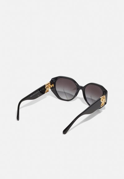 Black octagonal sunglasses with gradient tinted lenses and gold hardware accents on the temples. Smooth finish, modern design.