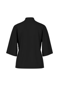 Black short-sleeve top with a high collar and loose fit. Made of smooth fabric, featuring a minimalist design without visible fasteners or embellishments.