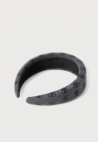 Μαύρη και γκρι υφασμάτινη κορδέλα για το κεφάλι με υφή, λεία εσωτερική επιφάνεια, στρογγυλεμένο σχήμα και κεκλιμένες άκρες.